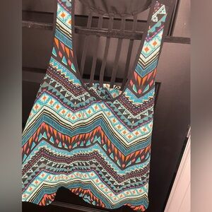 Aztec print patterned tank top. Light material with straps down the back.